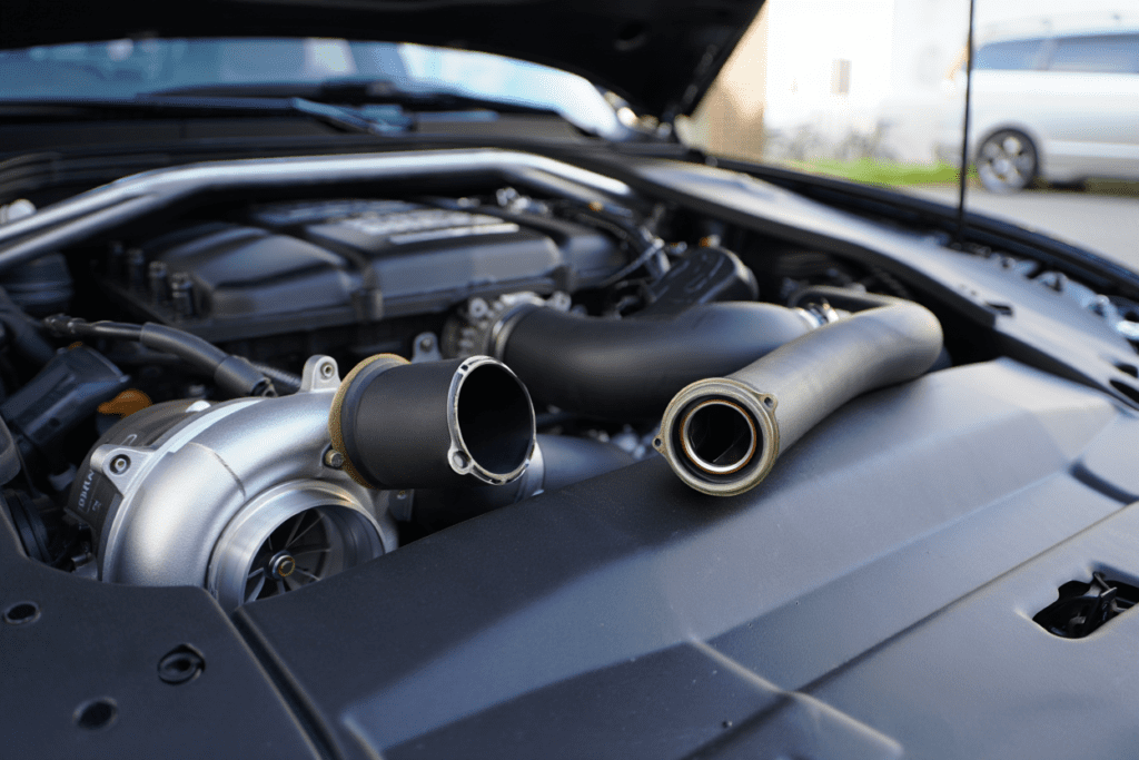 Engine bay showing a turbo or intake fault that can cause limp mode and power restriction.