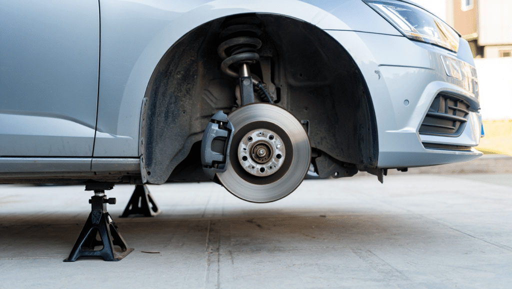 Brake pads and brake disc visible during a brake check at Medway Vehicle Services.