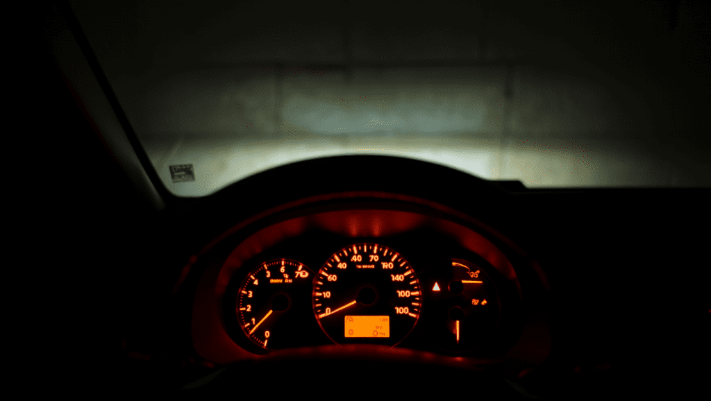Dashboard warning lights indicating a car overdue for servicing in Medway.