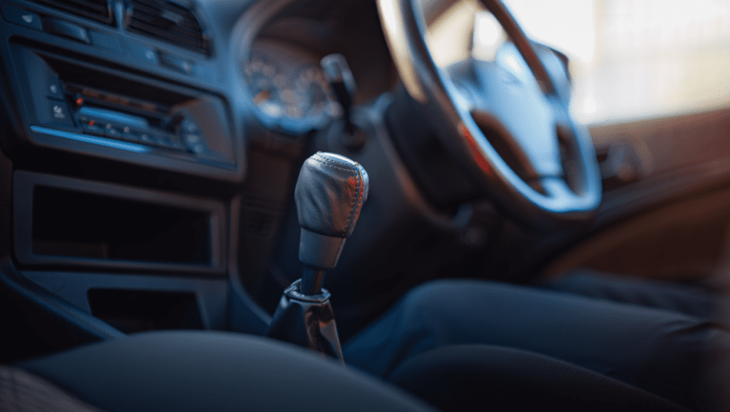 Manual car clutch pedal and gear lever showing signs of clutch wear in Medway.